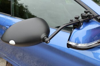 milenco towing mirror attached to a blue car